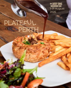 Savory pastry pie on a white plate with fries and salad as rich gravy is poured over it; 'Plateful Perth' text appears on the wooden table.